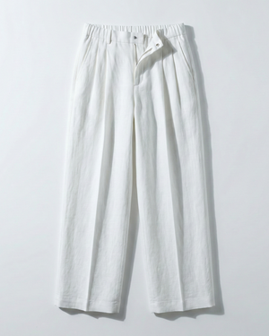 White wide-leg pants on a light gray background