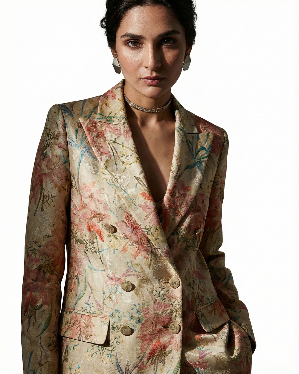 Floral patterned blazer on a white background