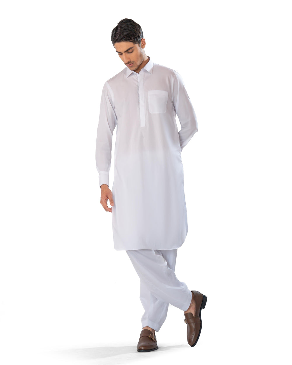 Man wearing a white kurta with a white background